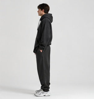 Side view of the relaxed fit GRIPT FW26 Heavyweight Joggers on model